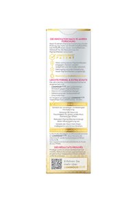 NIVEA Luminous630 cream box, white with gold accents. Contains text in multiple languages and a QR code. Key details highlighted in yellow.