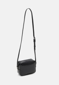 Tommy Jeans MUST CAMERA BAG PATENT  - Borsa a tracolla - black