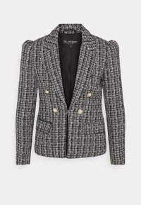 Blazer i sort og hvid tweed, med en tætsiddende pasform, dobbeltknaplukning med perleknapper og strukturerede skuldre. Tekstureret stof.