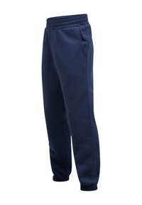 Marineblauwe fleece joggers met een taps toelopend ontwerp, een elastische tailleband, twee zijzakken en elastische boorden voor comfort en bewegingsvrijheid.