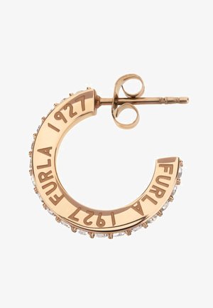 Zelta krāsas apli auskari ar izceltu "FURLA 1927" tekstu, rotāti ar caurspīdīgiem rhinestones ap apakšējo malu. Cirkulārs dizains ar stiprinājumu.