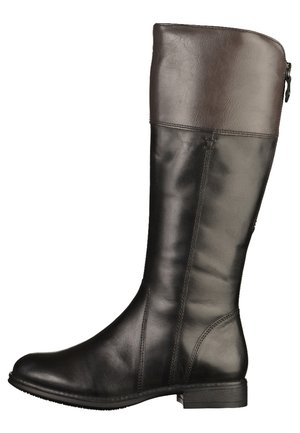 Botte en cuir noir montant jusqu'au genou avec un revers marron foncé, talon bas, bout arrondi et fermeture éclair latérale.
