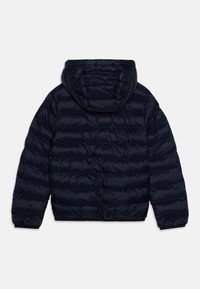 Tommy Hilfiger LIGHTWEIGHT UNISEX - Winter jacket - desert sky