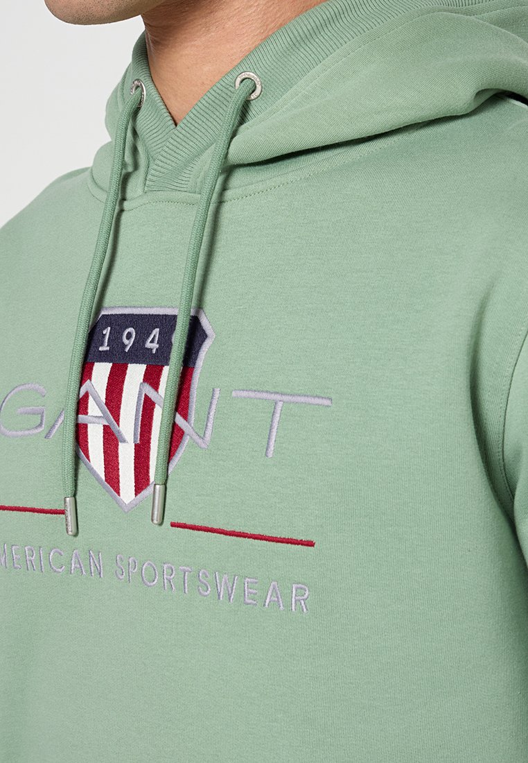 REG ARCHIVE SHIELD HOODIE