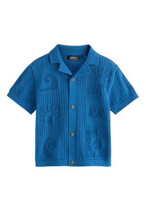 Blå kortærmet strikket cardigan med krave, knaplukning foran og teksturerede sol- og bølgemønstre på stoffet.