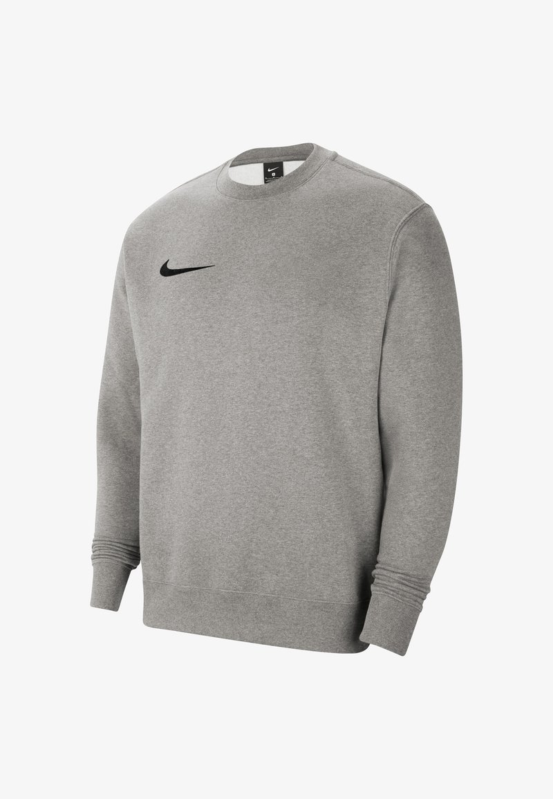 Sudadera gris hecha de material suave, cuenta con un cuello redondo, mangas largas y un logo negro de Nike en el pecho. Puños y dobladillo de canalé.