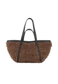 Brown textured tote bag with curly fabric exterior and black leather handles. The bag features a broad, rounded shape and a flat base.