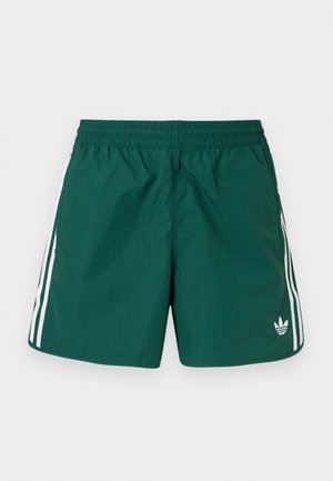Mørkegrønne atletiske shorts med elastisk midjebånd, hvite sidelister og en liten hvit Adidas-logo på nedre venstre ben.