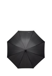 Parapluie noir avec un motif géométrique, poignée ronde et huit panneaux avec une texture lisse, vue de dessus sur un fond blanc.