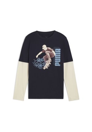 Blouse met lange mouwen in marineblauw met crèmekleurige mouwen. Bevat een grafisch ontwerp van een skateboarder en de tekst "PUMA". Gemaakt van katoen met een gladde textuur.