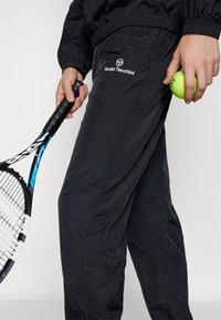 Sergio Tacchini NAYLA - Tréningruha alsók - black/gardenia