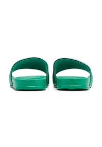 Green slide sandals featuring a smooth, shiny finish, open toe design, and a flat sole with a textured surface for grip.