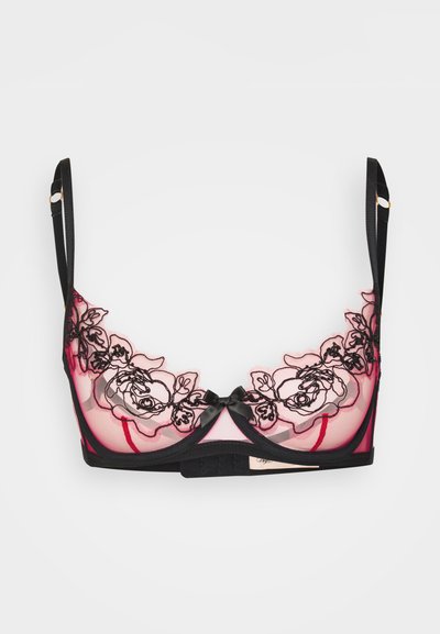 Sujetador de encaje negro con una base rosa transparente, con bordados florales, detalle de lazo en el centro, tirantes ajustables y cierre de gancho y ojo.