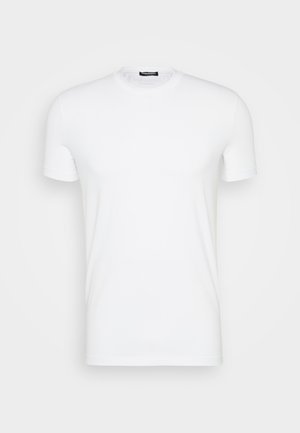 Valge puuvillane T-särk ümmarguse kaelusega, lühikeste varrukatega ja siledast tekstuurist. Muster või graafika puuduvad.