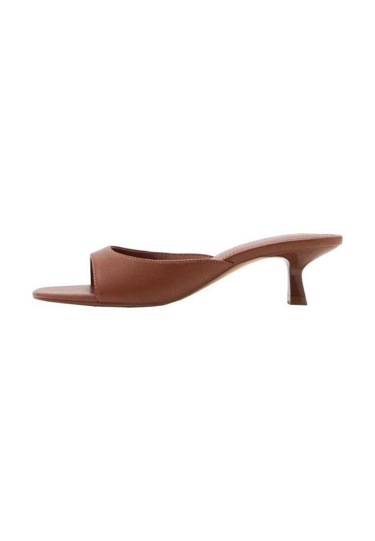 Brown open-toe heeled mules with a smooth, matte finish, featuring a curved design and a transparent, tapered heel.