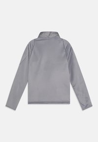 Gray pullover jacket with a stand collar, long sleeves, and a smooth texture. Features flat seams and a slightly cropped design.