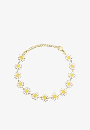 Zelta ķēdes kaklarota ar maiņojošām baltām un dzeltenām margrietiņām. Katram ziedam ir apaļš centrs, kas savienots ar metāla saišu palīdzību.