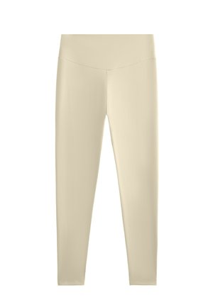 Leggings beige in tessuto morbido ed elastico. Design a vita alta, forma aderente, lunghezza completa, senza pattern visibili o accessori.