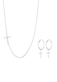 Silberne Schmuckset mit einer Kettenhalslace und einem kleinen Kreuzanhänger sowie passenden Creolen, beide mit "925" für Sterlingsilber gekennzeichnet.
