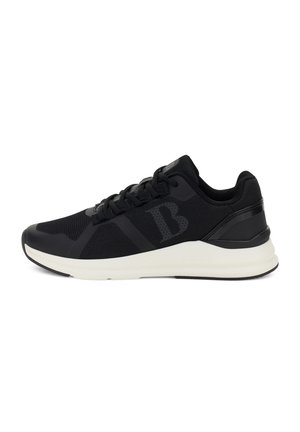 Zapatillas deportivas negras con parte superior de malla, cuello acolchado y suela de goma blanca. Presenta un logotipo y acentos texturizados en el lateral.