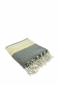 Katoenen deken in grijs met gele en witte horizontale strepen. Getextureerd oppervlak met franjes en decoratieve zigzagstiksels.