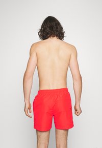 Calvin Klein Swimwear MEDIUM DRAWSTRING - Shorts da mare - bright vermillion
