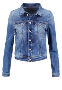 Denim jacket featuring a button-up front, two chest pockets, and long sleeves. Light blue wash with a slightly faded texture.