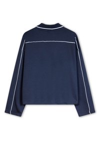 Mörkblå långärmad polo med vitrandig detalj längs ryggen och ärmarna, med klassisk krage och avslappnad passform.