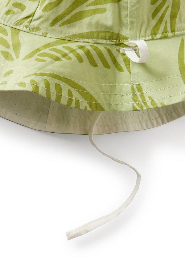 REVERSIBLE WITH TROPICAL PRINT – Hut