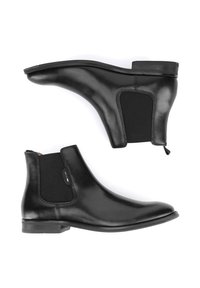 Crne čizme do gležnja od kože s elastičnim bočnim panelima, zaobljenim vrhom i niskom blok petom. Glatka tekstura s minimalnim detaljima.