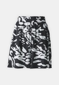 Black and white skirt featuring an abstract pattern, elastic waistband, casual design, knee-length, and soft fabric texture.