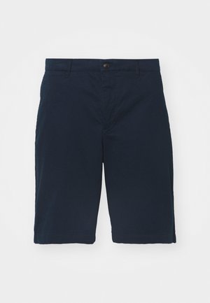 Navyblaue Shorts aus Baumwolle mit flachem Bund, Knopfverschluss und Seitentaschen. Knielang mit glatter Textur und sauberen Nähten.