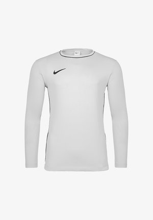 Hvid atletisk langærmet trøje med sort Nike-logo på højre bryst og tynd sort kant langs kraven og siderne.