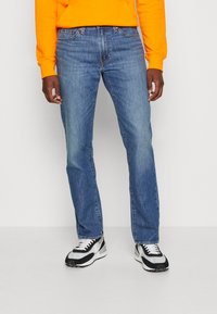 Levi's® 511 SLIM - Jeans straight leg - chanterelle cool