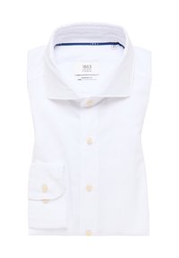 Camicia bianca con un taglio moderno, dotata di colletto classico, polsino con un bottone e leggeri accenti in bottoni. Tessuto testurizzato.