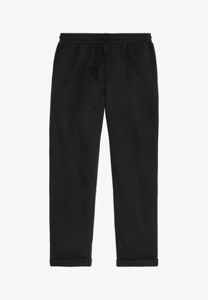 Black sweatpants made of soft fabric with an elastic waistband, drawstring, and side pockets; tapered legs with cuffs at the ankles.