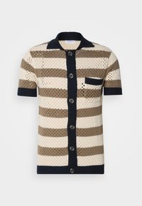 Cardigan tricot à manches courtes avec rayures horizontales crème et marron, patte de boutonnage noire, col, poignets, ourlet et poche poitrine.