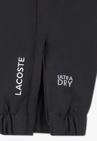 Lacoste DIAMOND - Hlače - black