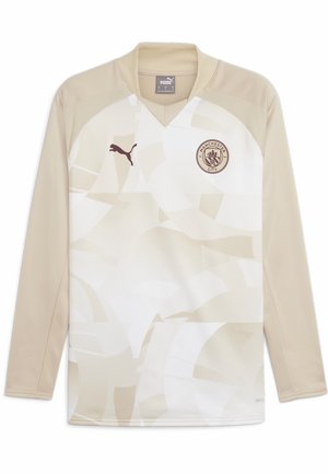 Beige-langärmliges Fußballtrikot mit abstrakten, hellen Designs. Verfügt über einen V-Ausschnitt, Puma-Logo und Manchester City-Emblem in Dunkelbraun.