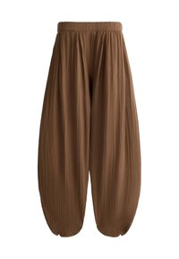Pantalon marron à coupe ample en tissu texturé, avec une taille élastique et des ourlets effilés et arrondis.