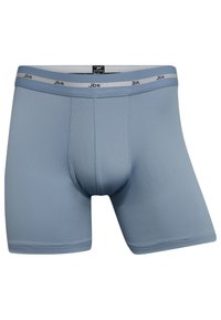 Lyseblå boxershorts med en tætsiddende pasform, lavet af blødt stof. Har en grå elastik med Jbs-logoet i sort.