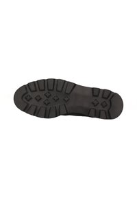 Suela de zapato negra con un patrón de textura rugosa, que presenta secciones elevadas y una serie de cruces para proporcionar agarre y tracción.