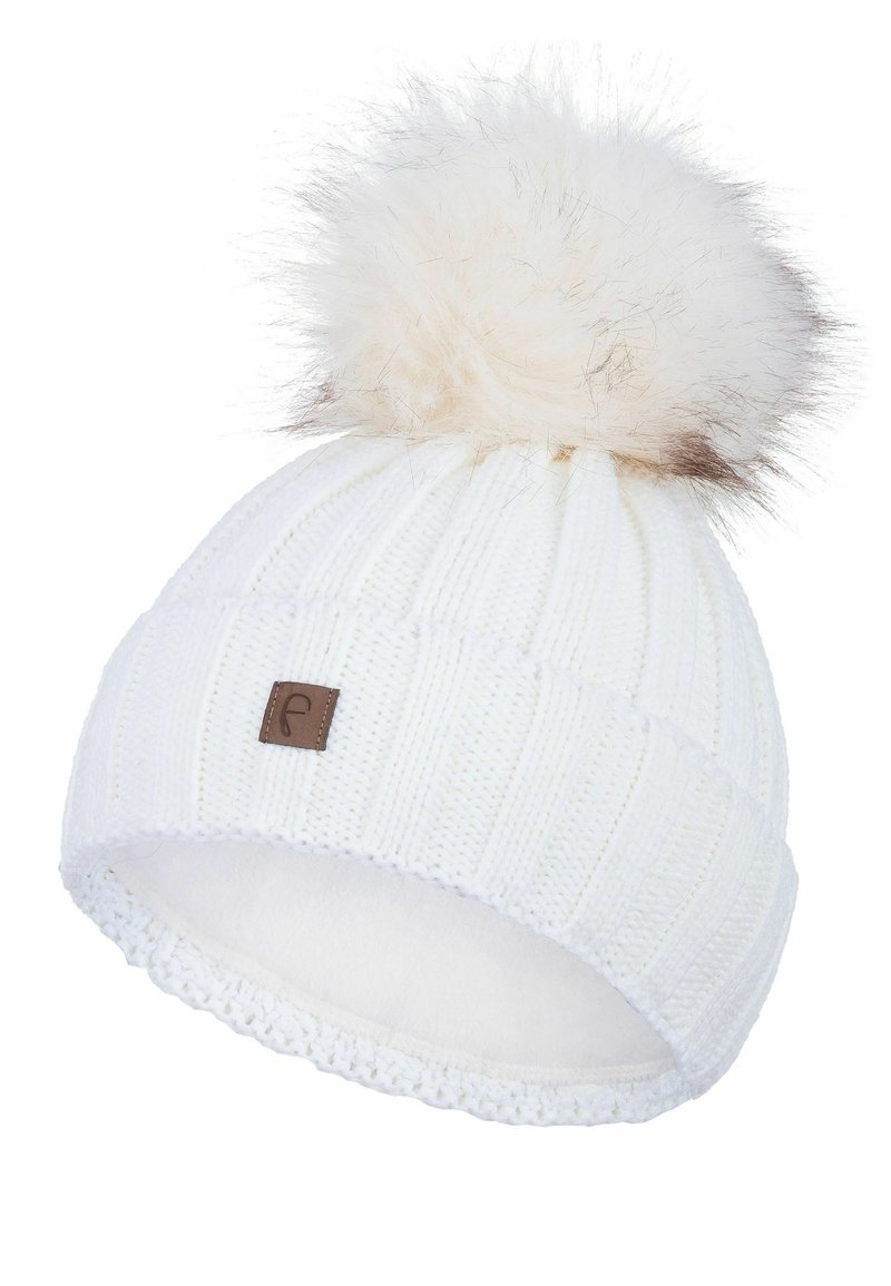 White knitted beanie with a fluffy white pom-pom, brown leather logo patch, and soft inner lining. Features ribbed texture and lace trim.