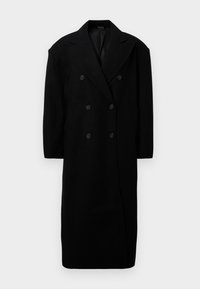 Manteau noir croisé en mélange de laine, avec de grands revers, six boutons et des poches latérales. Coupe droite avec épaules rembourrées.