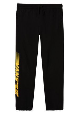 Pantalon de survêtement noir avec taille et poignets élastiques, poches latérales, et logo jaune Vans Off The Wall imprimé verticalement sur une jambe.