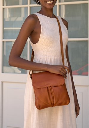 Gusti Leder VEHA - Cross body bag - cognac
