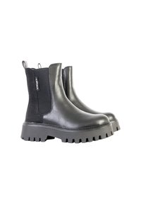 Botas Chelsea negras hechas de cuero y gamuza, con una suela de goma gruesa, paneles laterales elásticos y una lengüeta para facilitar su uso.