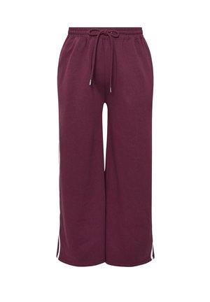 Burgundy-huonehousut, joissa on kiristettävä vyötärö, leveät lahkeet ja valkoiset sivuraitat, valmistettu pehmeästä puuvillasekoitekankaasta.