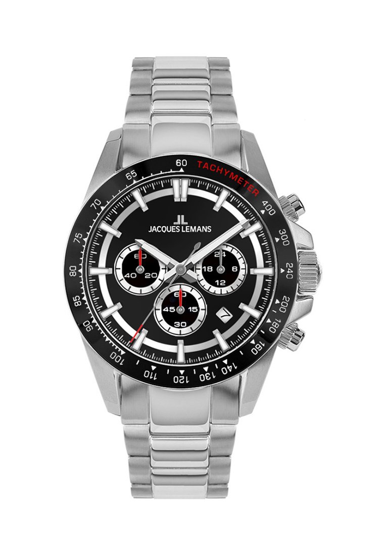 Reloj de acero inoxidable con esfera negra, subesferas plateadas, bisel tacómetro y pulsera de eslabones plateada. Presenta marcadores de hora y agujas en negrita.