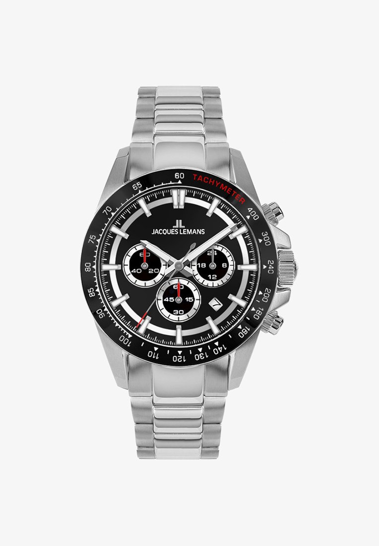 Nerūsējošā tērauda pulksteņi ar melnu ciparnīcu, sudraba subdials, tachymetru bezeli un sudraba saites jostu. Iezīmes drosmīgi stundu marķējumi un rādītāji.